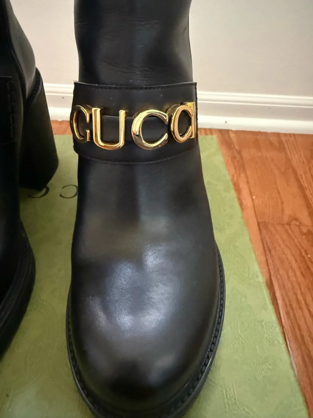 Gucci Black Leather Ankle Boots with Gold Logo Strap - Picture 2 of 9